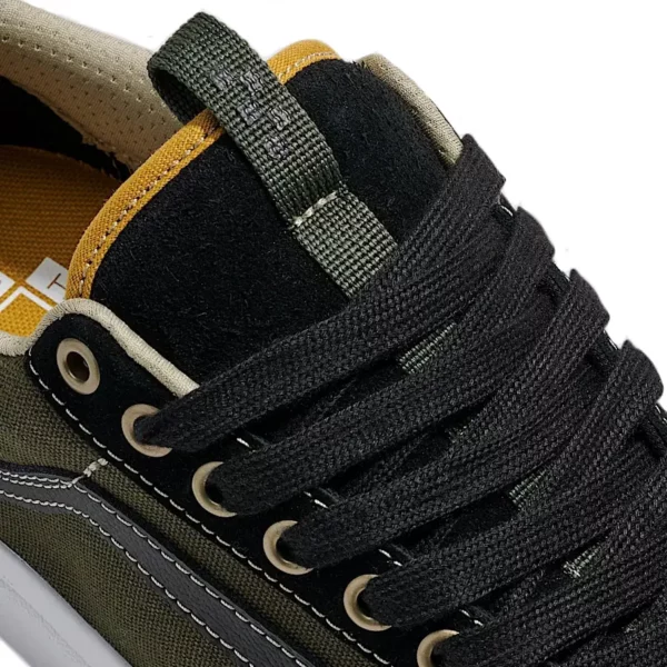 Vans Skate Old Skool 36+ fekete és zöld színű gördeszkás cipő – ikonikus stílus modern frissítésekkel.